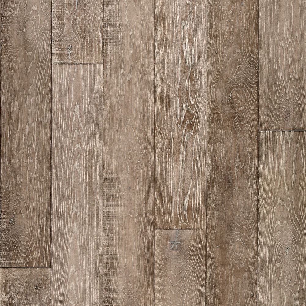 Light brown wood flooring with white grain highlights.