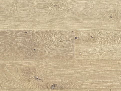 Light wood flooring, with visible wood grain and knots.