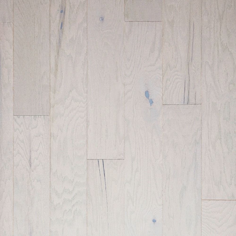 Light gray wood floor planks with visible grain and knots.