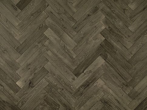 Herringbone pattern wood flooring in shades of gray-brown.