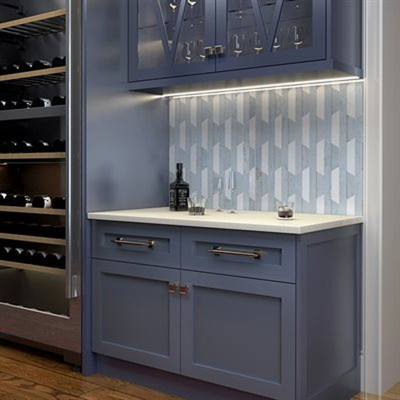 Blue bar cabinet with wine cooler, white countertop, glassware, liquor bottle, and tile backsplash.