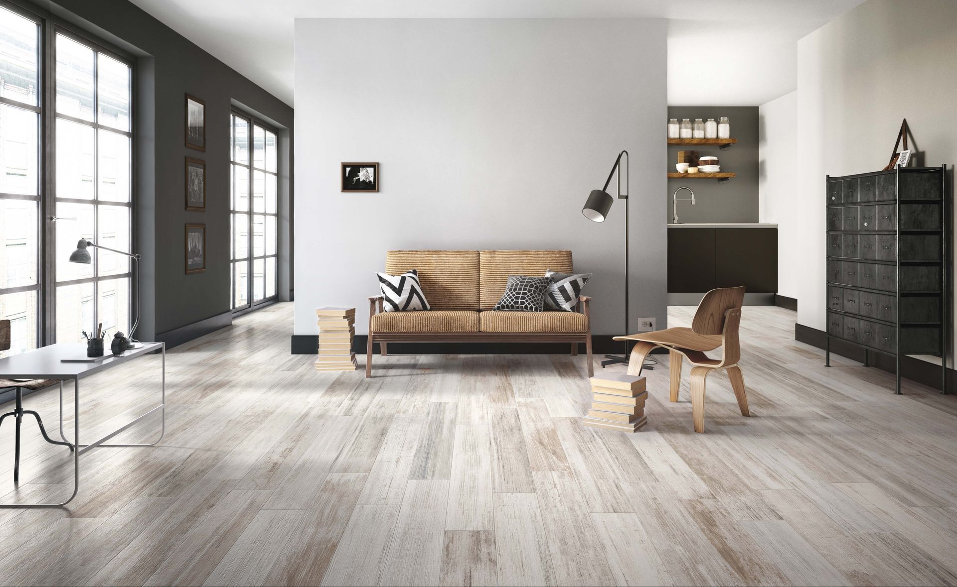 Living room with light wood floors, a brown sofa, and large windows.