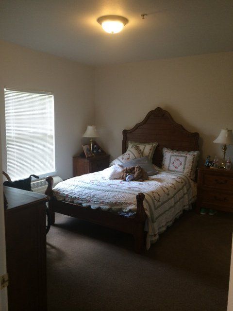 Bedroom with Lights On — Arlington, TX — Castle Rock Assisted Living