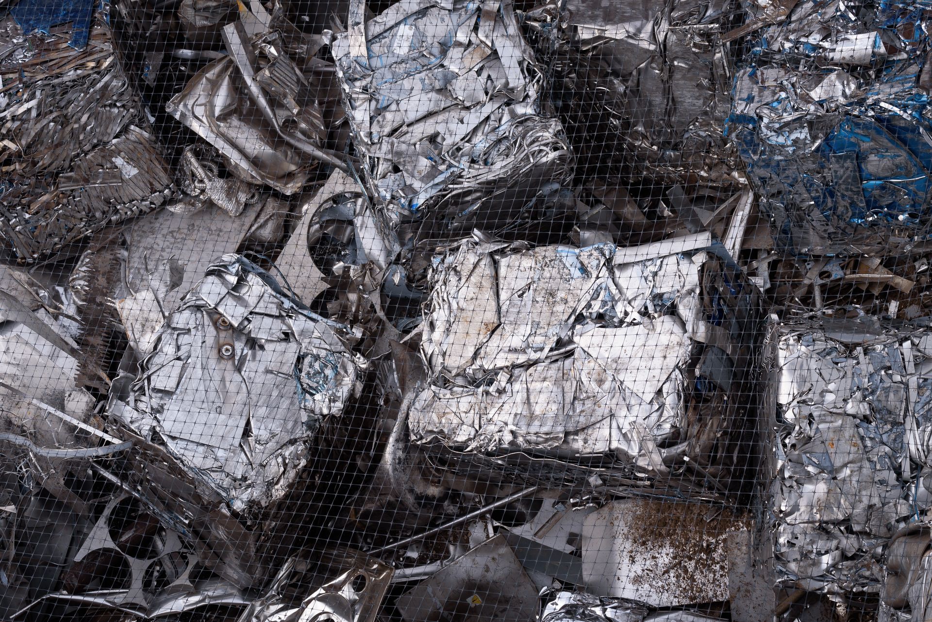 Scrap metal components recovered and bundled for recycling. Scrap metal components recovered and bundled for recycling.
