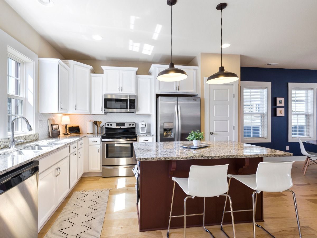 Beautifully organized home interior with spring flowers and bright natural light.