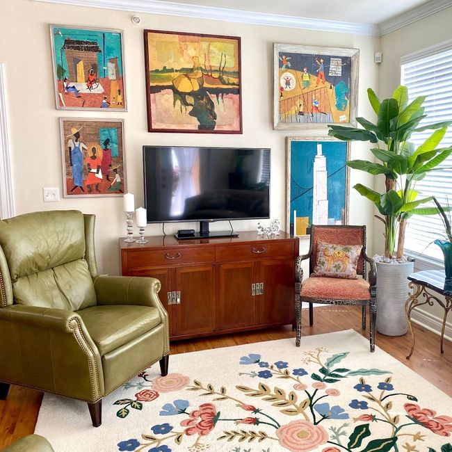 Living room layout and artwork hung by professional home decorators in Lafayette LA