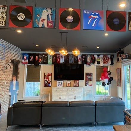 A living room with a couch and a flat screen tv