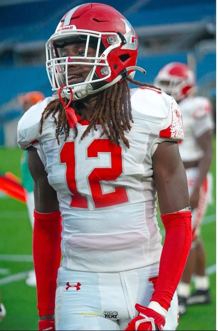 Damian Moore Jr. in his number 12 jersey on the field