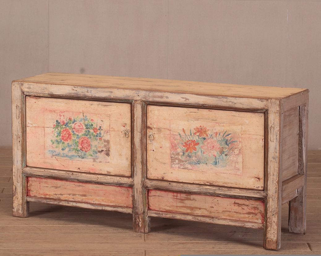 Cream-colored Chinese cabinet with two doors featuring floral paintings and a single drawer Tropic Living in Palm Cove, QLD