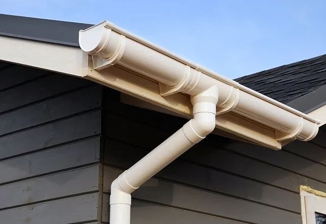 A White Gutter On The Side Of A House — All Roof Restorations & Solar In Northern Rivers, NSW