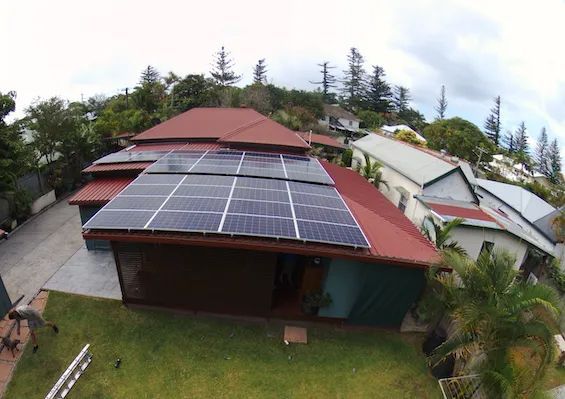 Red Roof with Solar Panels — All Roof Restorations & Solar In Tweed Heads, NSW