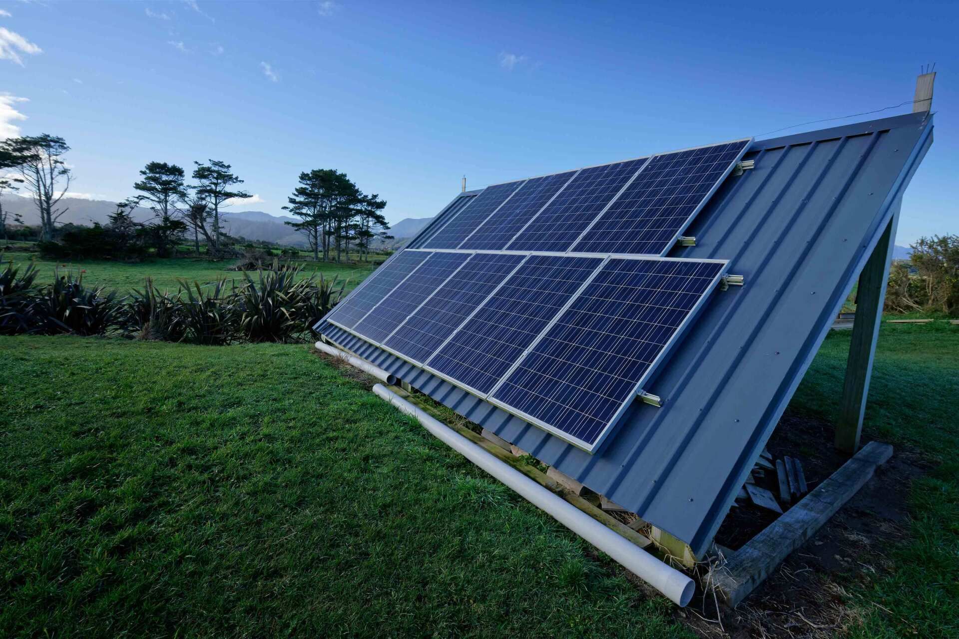 A Solar Panel Attached to A Stand in The Yard — All Roof Restorations & Solar In Northern Rivers, NSW