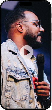 African American man with microphone - Mosaic Church, Freeport, FL