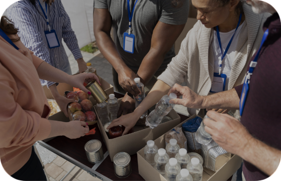 A group of people packing food pantry boxes - Mosaic Church, Freeport, FL