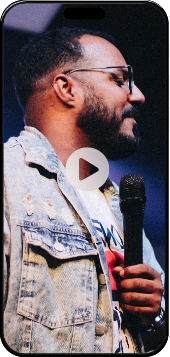 Black man holding microphone - Mosaic Church, Freeport, FL