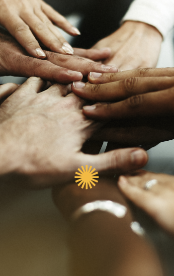 Diverse hands holding hands - Mosaic Church, Freeport, FL