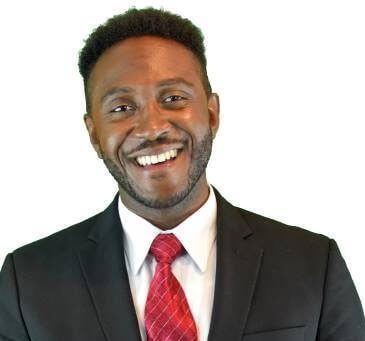 Man in suit with a red tie, smiling. Man in suit with a red tie, smiling.