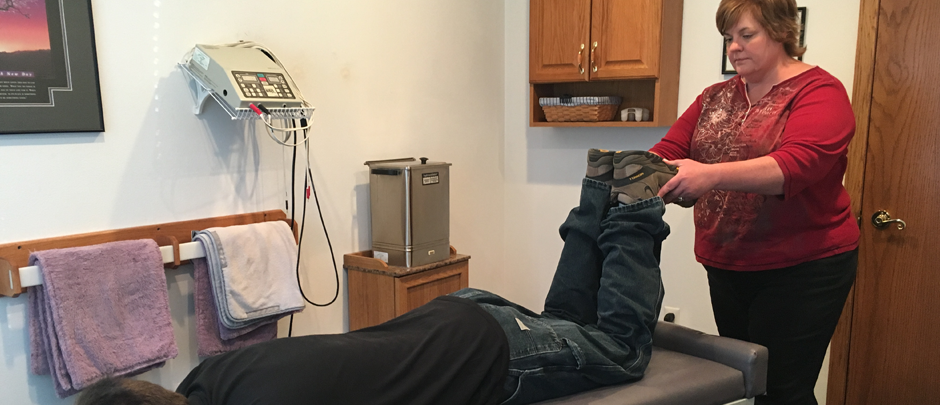 Dr. Shannon Carpenter at Work — Janesville, WI — Chiropractic Wellness Center Dr. Shannon Carpenter at Work — Janesville, WI — Chiropractic Wellness Center