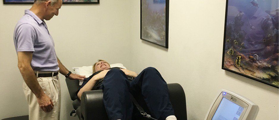 Checking Pain — Janesville, WI — Chiropractic Wellness Center Checking Pain — Janesville, WI — Chiropractic Wellness Center