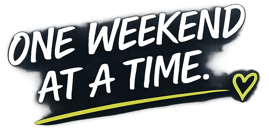 Text graphic reading “ONE WEEKEND AT A TIME” with a yellow heart and underline on a dark background