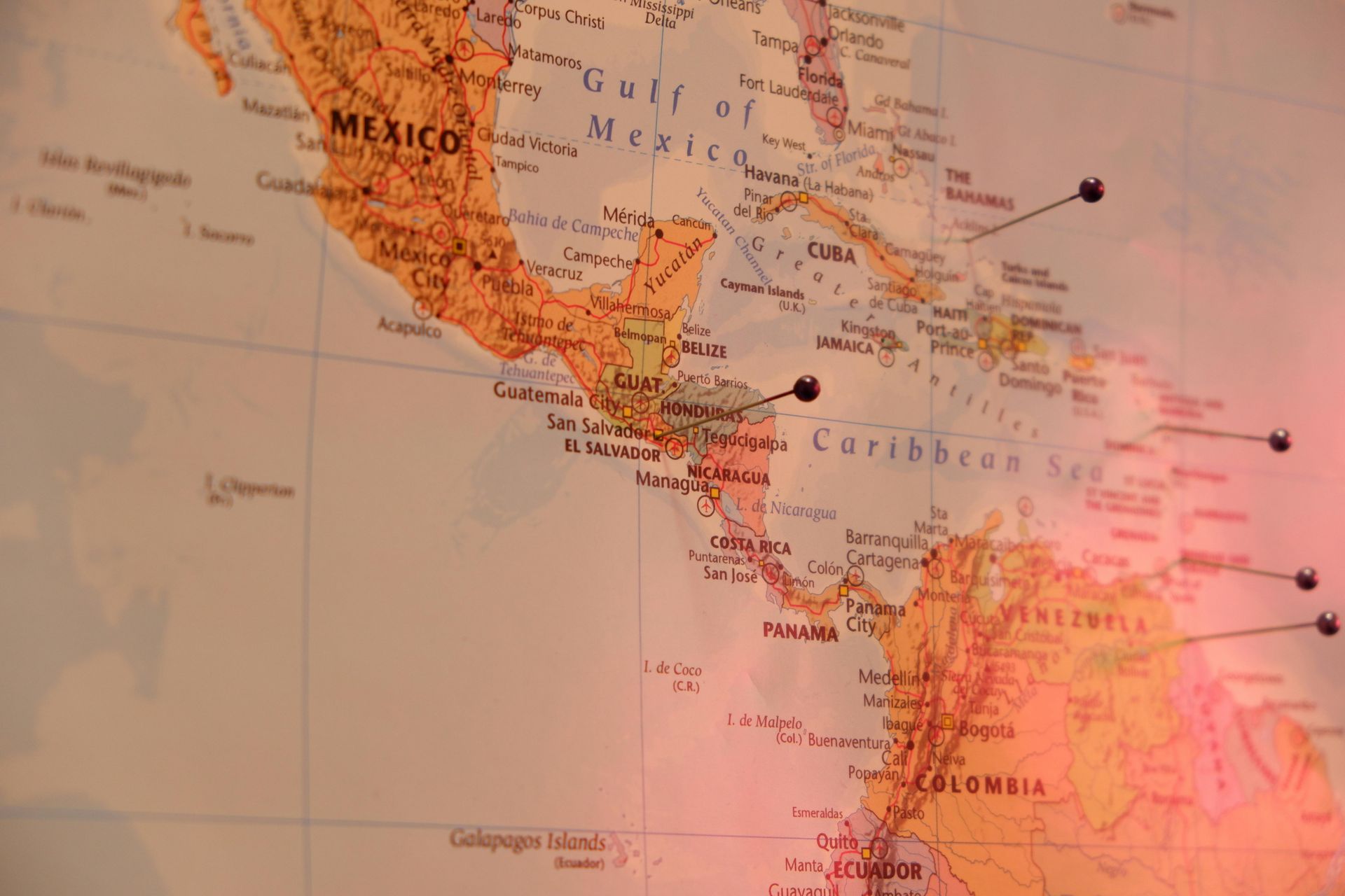 Map of Central America and the Caribbean, with pins marking locations.