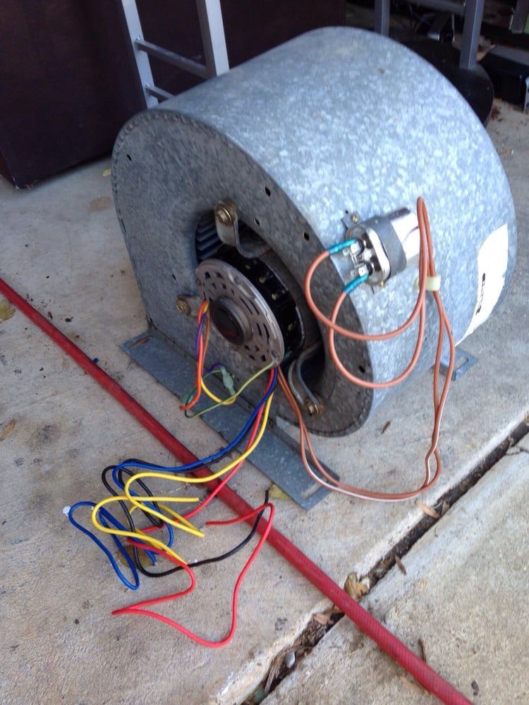 A motor with a bunch of wires attached to it