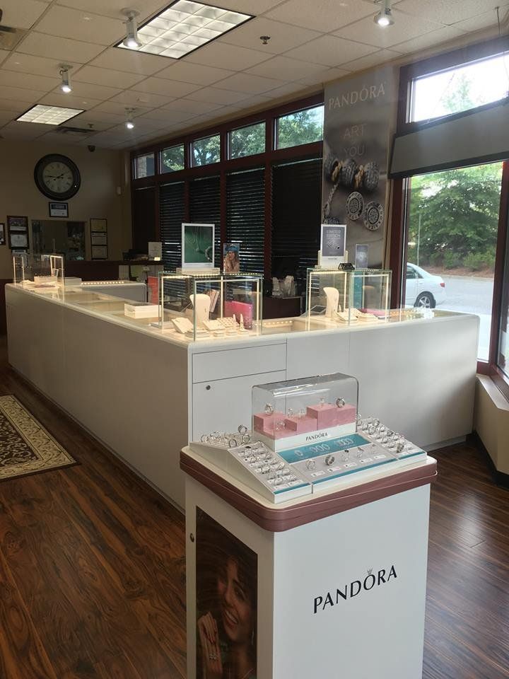 A pandora store with a lot of jewelry on display