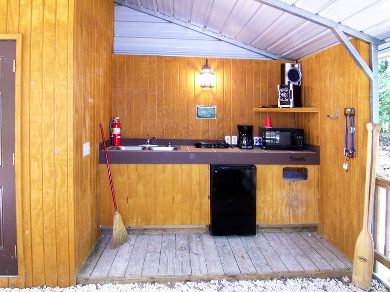 a small kitchen with a sink and a microwave