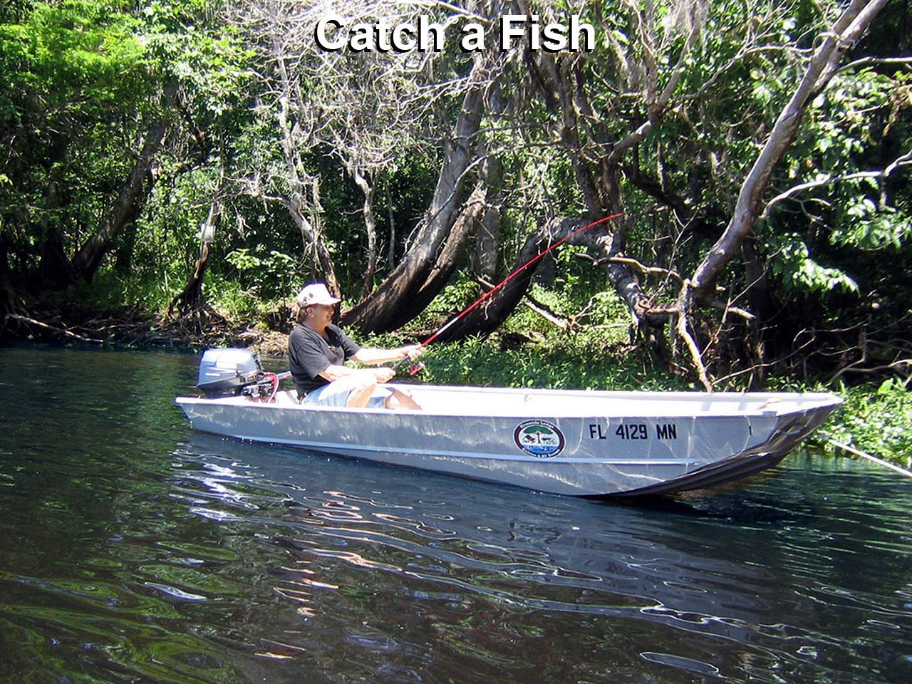 a man in a boat with a license plate that says fl 429 w