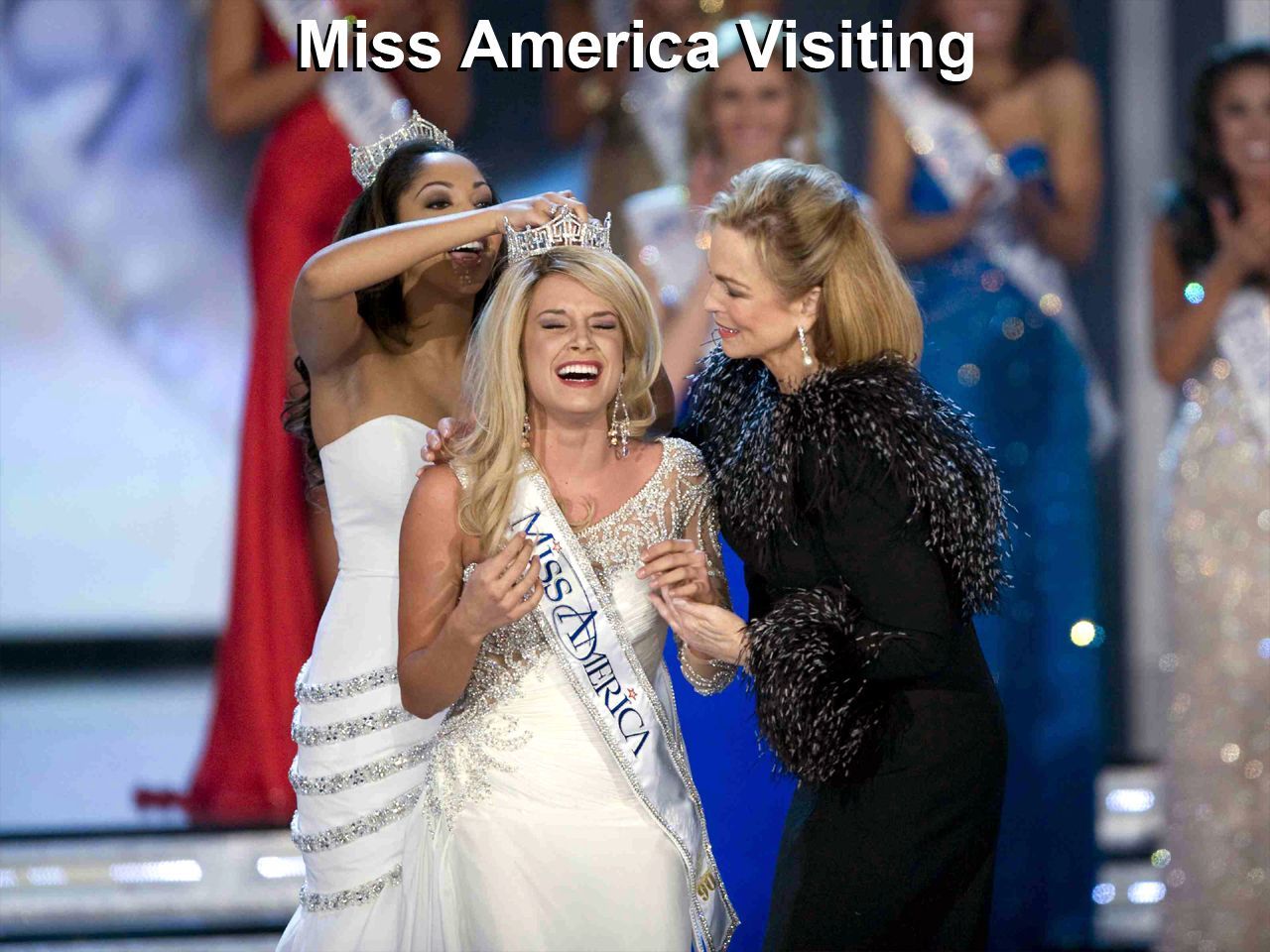 a woman in a miss america sash is being crowned