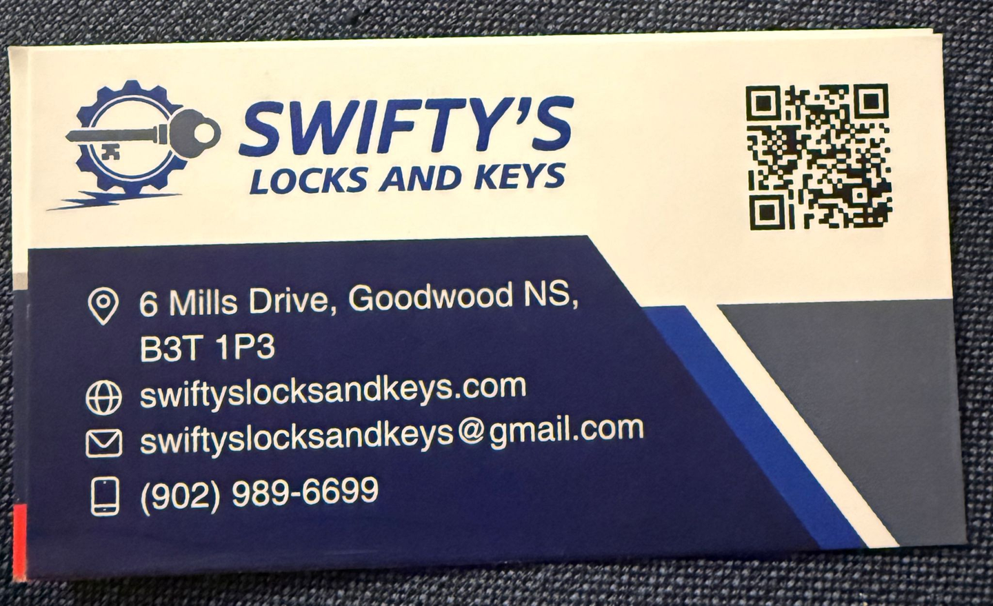 Swifty's Locks and Keys business card with contact details