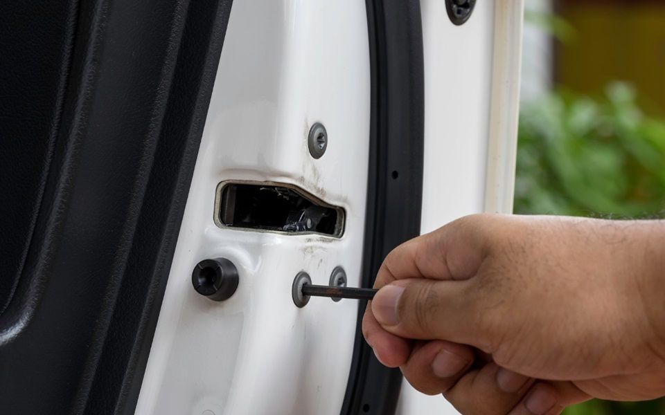 An allen key fixing a car door lock.