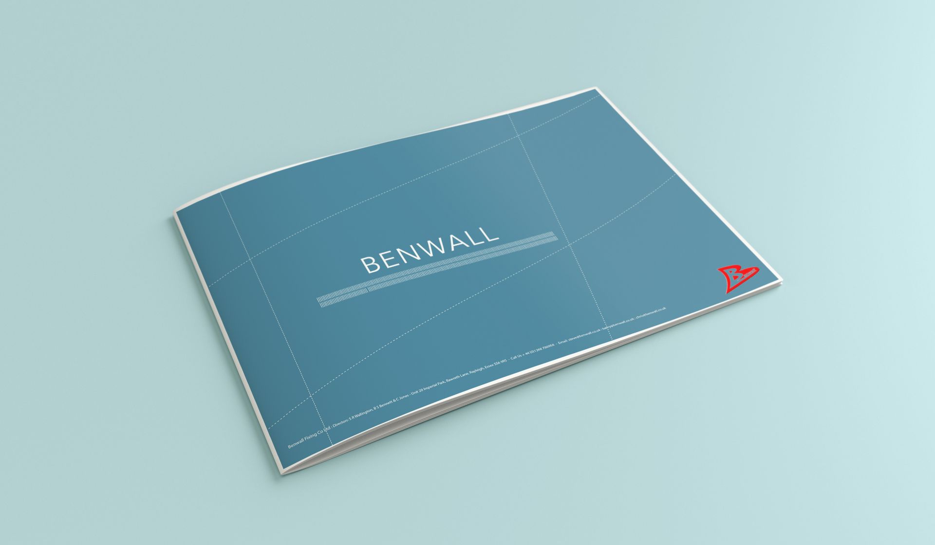 A blue book is sitting on a blue surface.