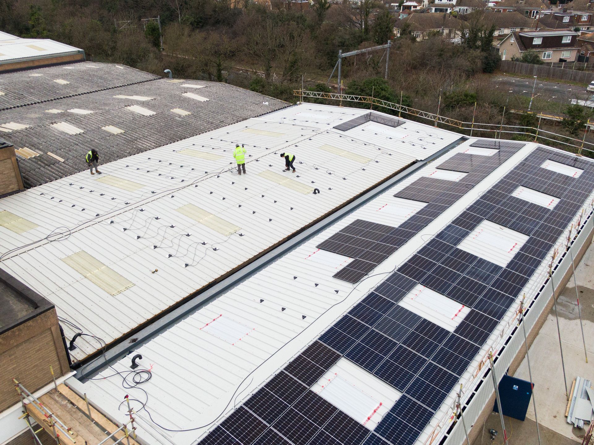 A roof with a lot of solar panels on it