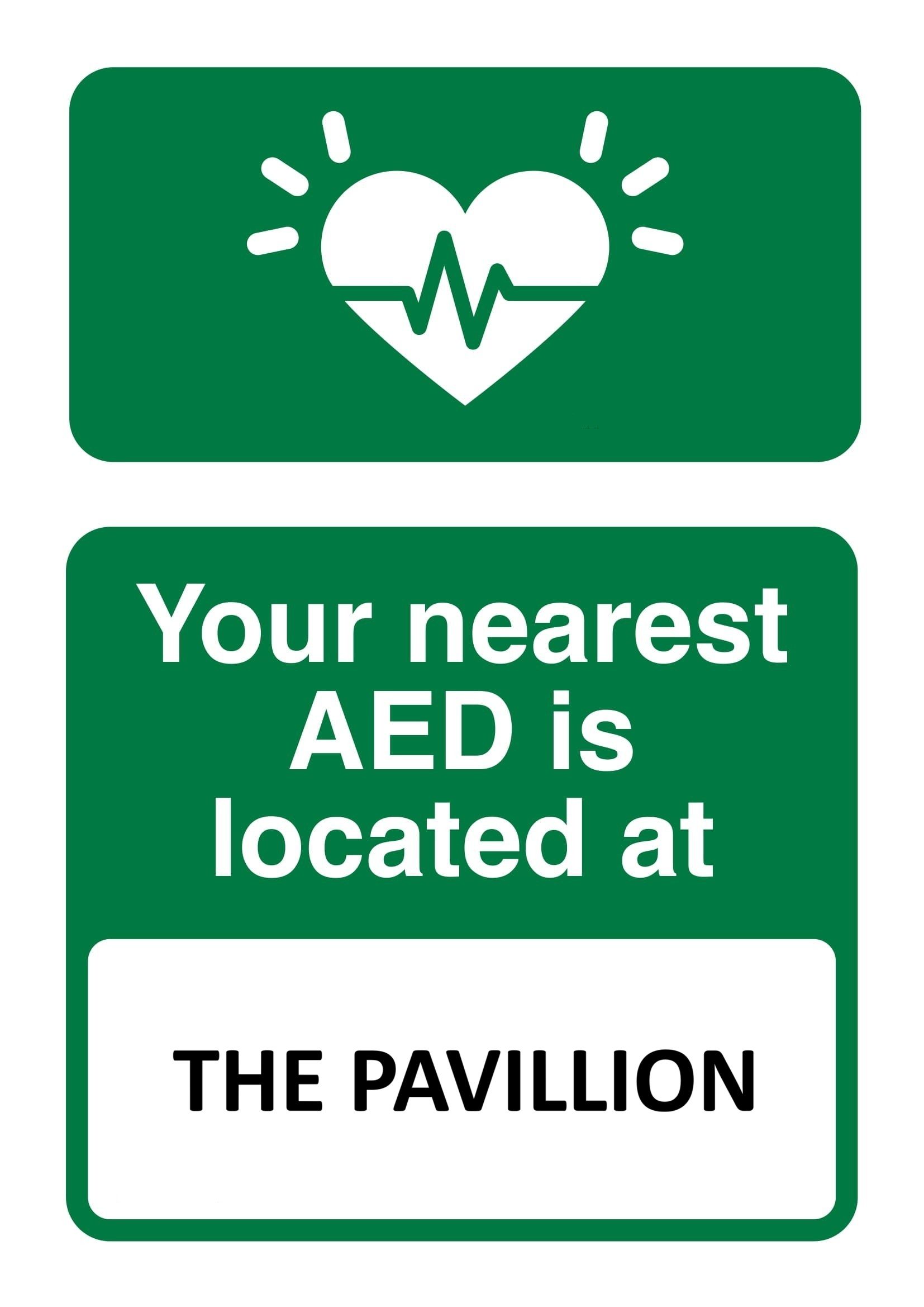 Sign indicating AED location: Heart symbol above text