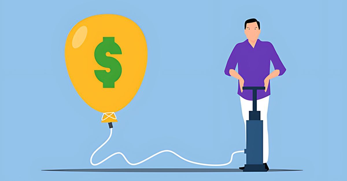 Person inflates a gold dollar-sign balloon with a hand pump against a light blue background