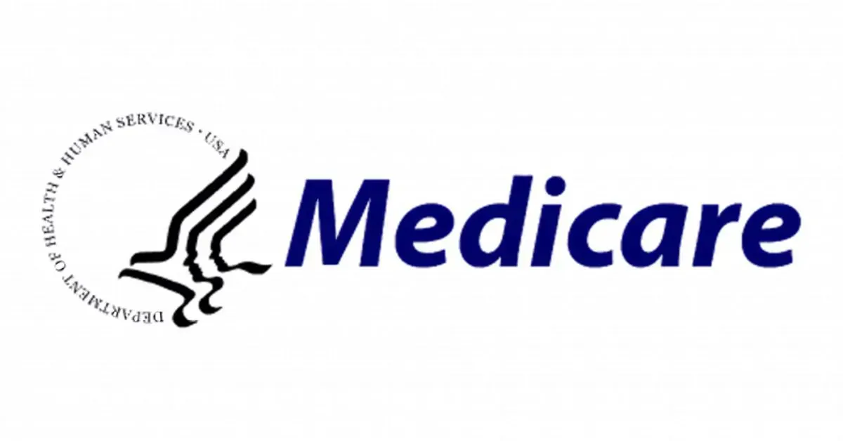 Medicare logo with blue text and a black medical emblem on a white background