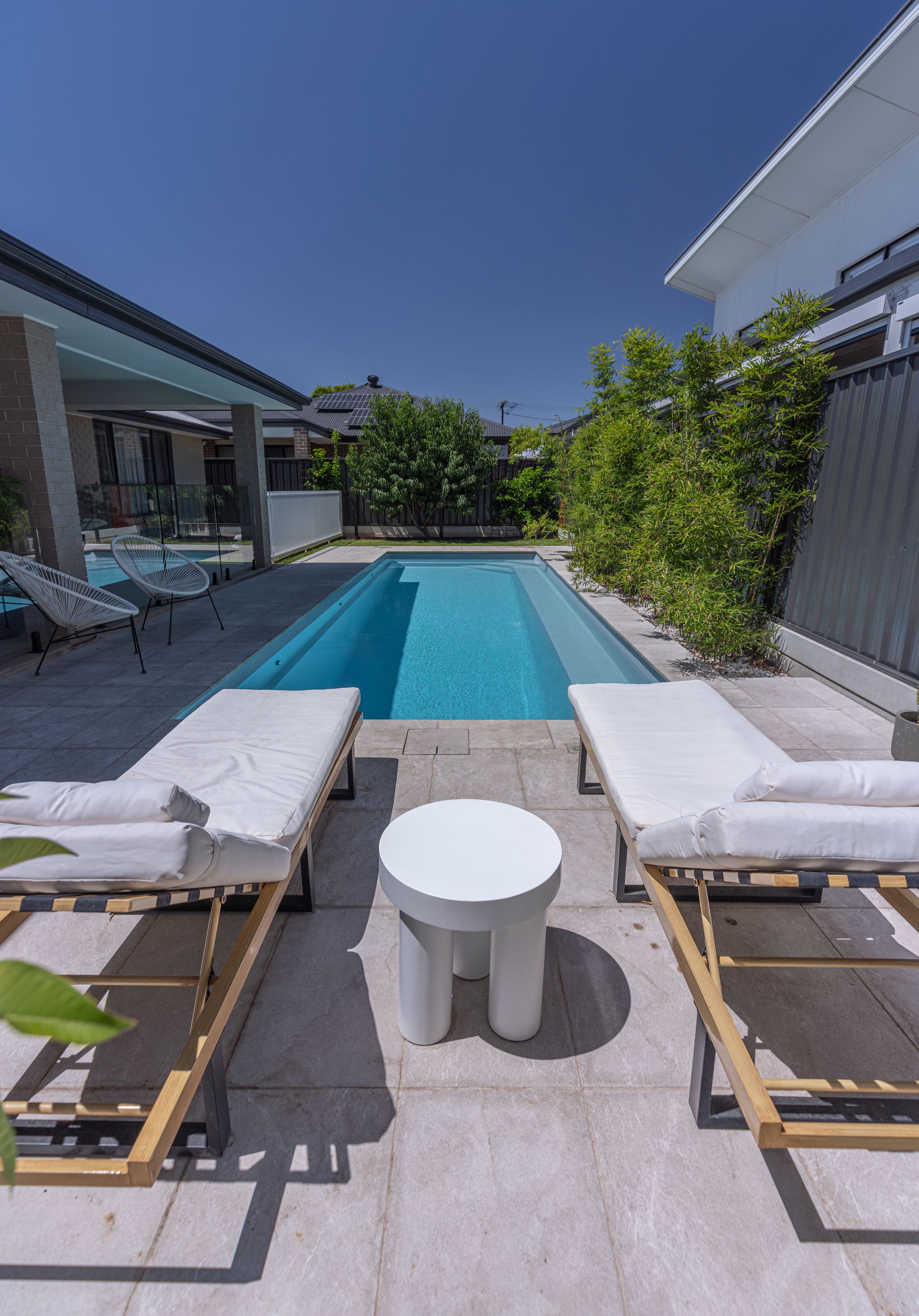 An Aerial View of a Large Swimming Pool — Gibson Family Pools Pty Ltd In Port Macquarie, NSW