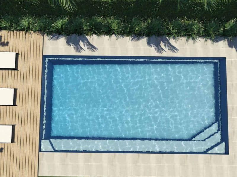 An Aerial View of a Large Swimming Pool — Gibson Family Pools Pty Ltd In Harrington, NSW