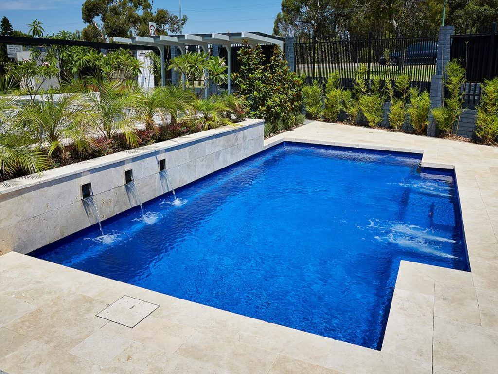 A Large Rectangular Swimming Pool With Blue Water — Gibson Family Pools Pty Ltd In Nambucca Heads, NSW