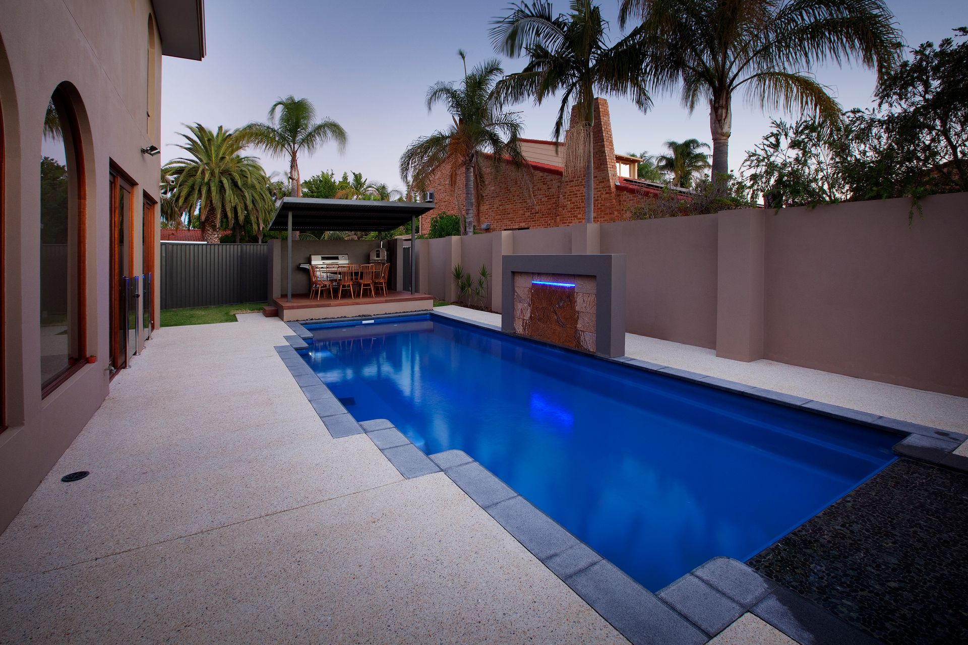 A Large Swimming Pool is Being Lifted by a Crane — Gibson Family Pools Pty Ltd In Harrington, NSW