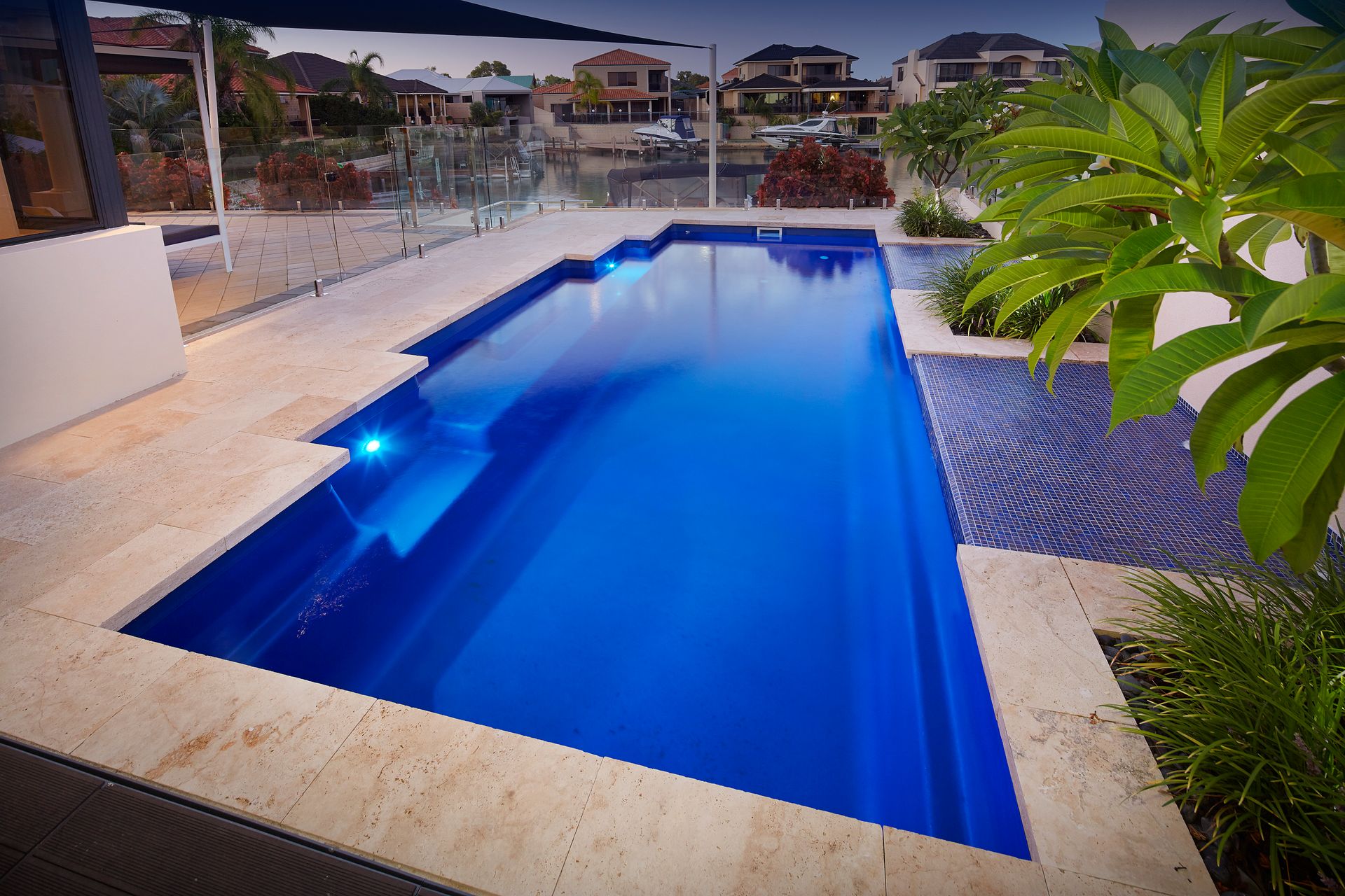 A Round Swimming Pool With Stairs Leading To It — Gibson Family Pools Pty Ltd In Port Macquarie, NSW