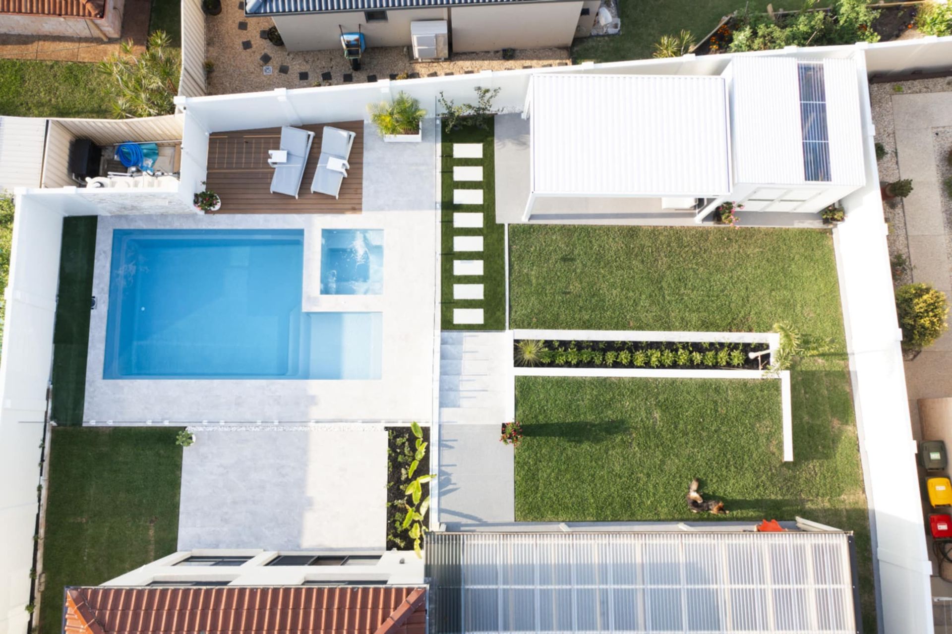 Aerial view of a modern backyard with a blue pool — Gibson Family Pools Pty Ltd In Port Macquarie, NSW