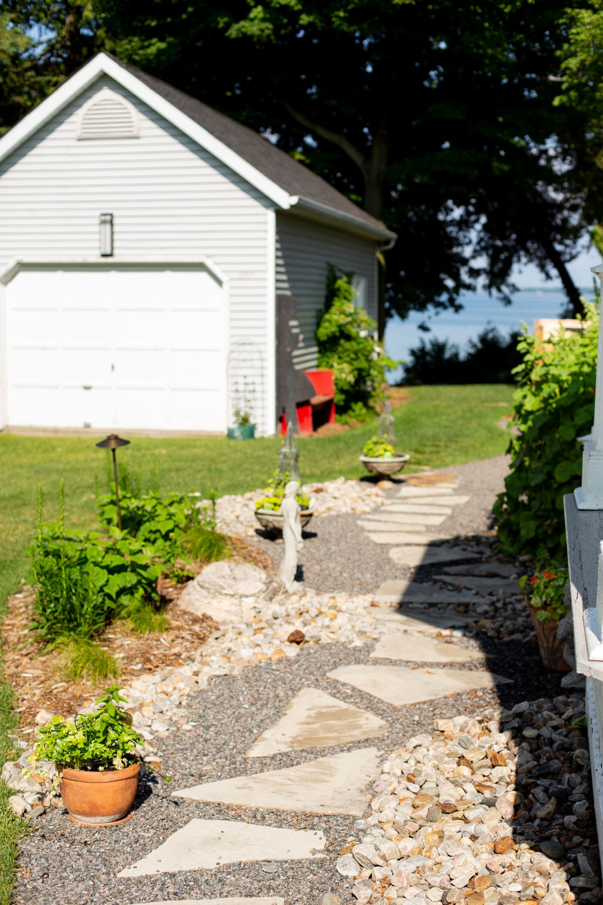stormwater management, rain garden design, waterwise landscaping, dry creek bed