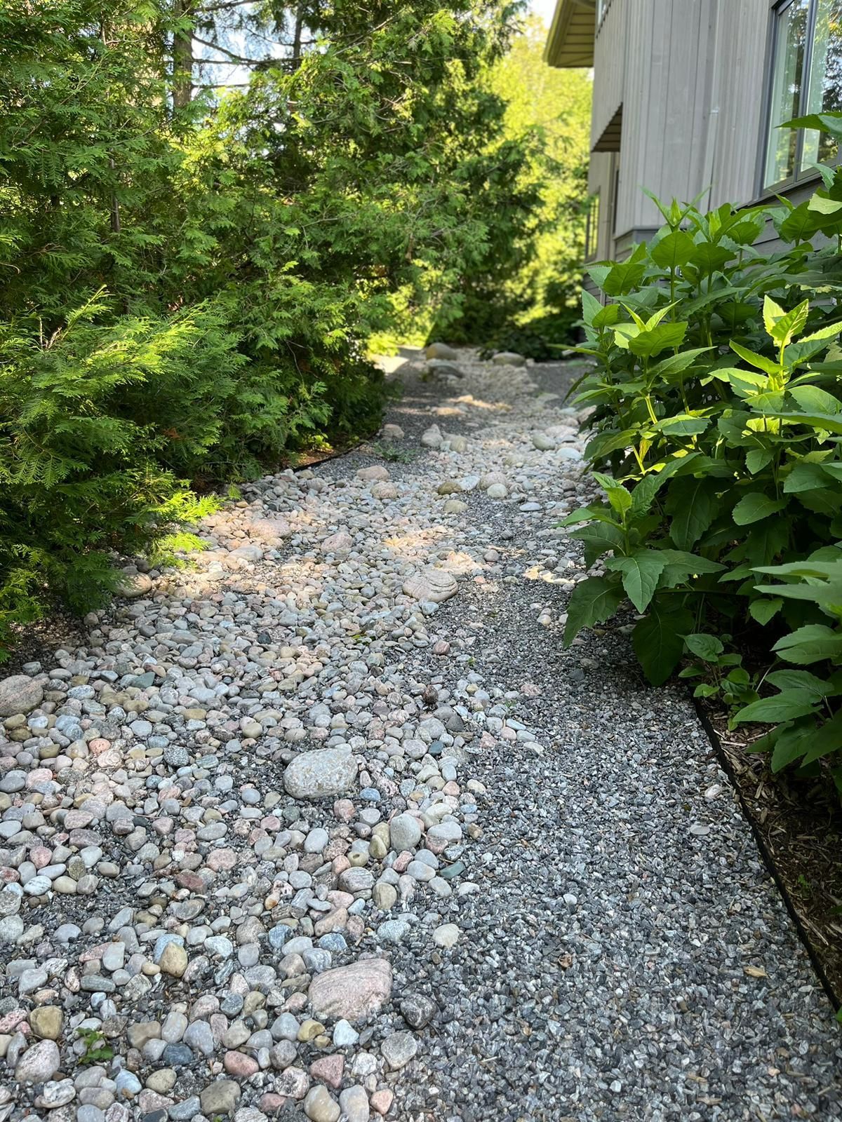 stormwater management, rain garden design, waterwise landscaping, dry creek bed