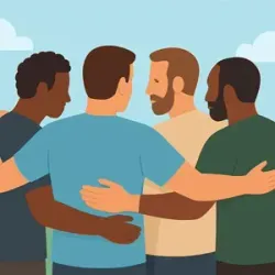 Four people standing with arms around each other in a supportive group hug outdoors