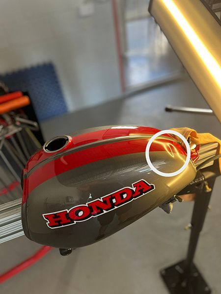 Dent in  a Honda Motorbike Tank — Dent Motive in Robina, Qld