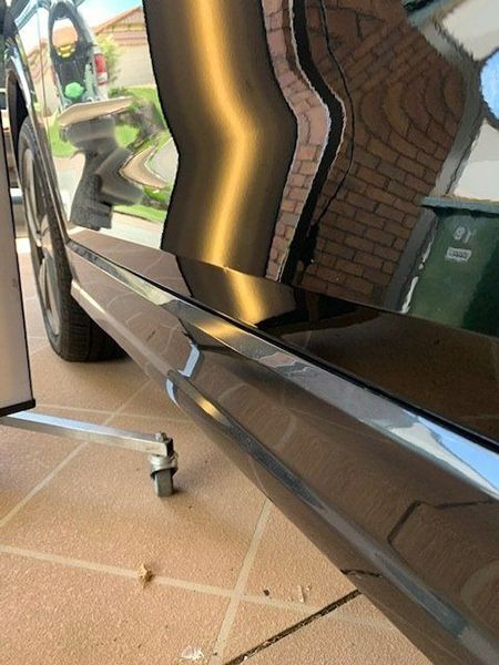 A Close-up Of a Car with A Dent on The Side — Dent Motive in Nerang, QLD