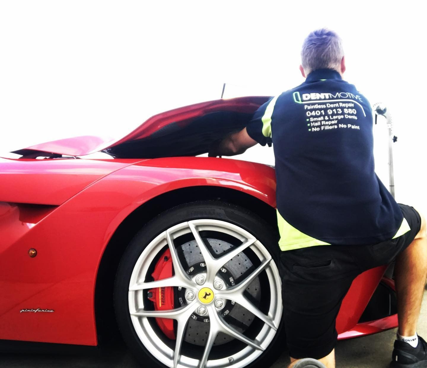 Fixing The Dent Of The Front Red Car — Dent Motive in Nerang, QLD