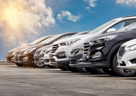 A Row of Cars Are Parked in A Parking Lot — Dent Motive in Runaway Bay, QLD